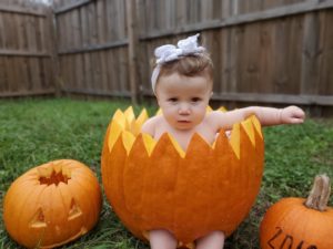 After a long photo shoot, this baby is ready to get out of the pumkin!