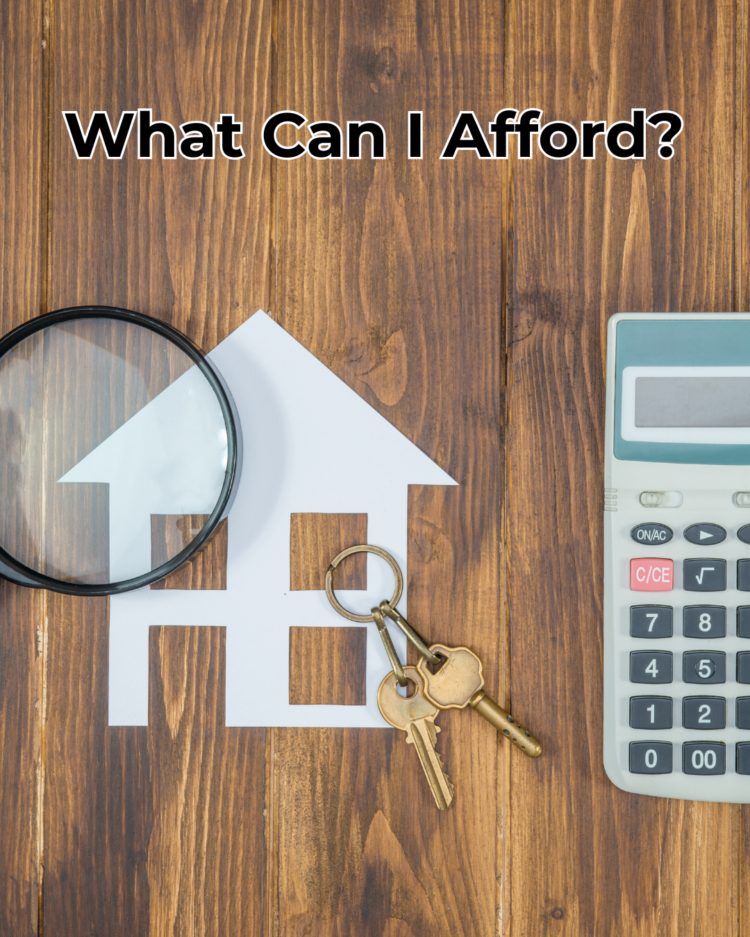 Flat lay of a house cutout with keys, magnifying glass, and calculator on a wooden surface with the text “What Can I Afford?”