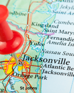 Close up map of Northeast Florida with a red push pin marking Jacksonville, showing surrounding areas including Orange Park, Yulee, Fernandina Beach, and St Johns.