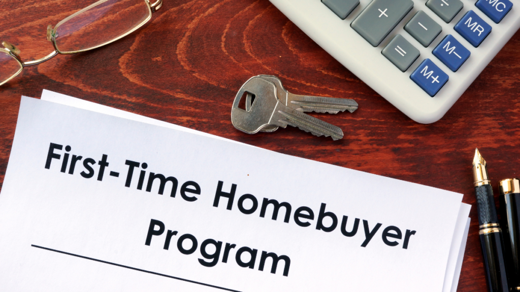 This image shows keys, calculator and says first time home buyer program. 
